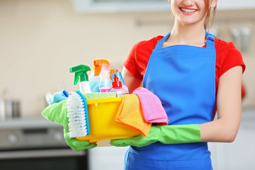 Carpet cleaning technician preparing equipment before a service appointment