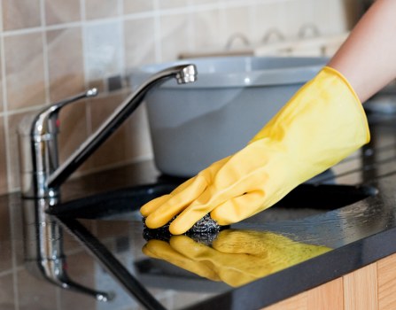 Domestic cleaning service for a home in Maidavale with a tidy living room setting