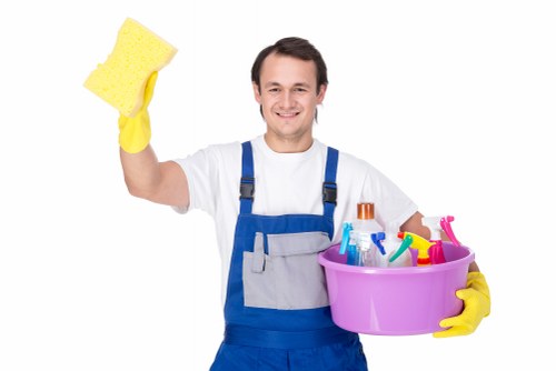 Cleaner working with recyclable materials and green service van