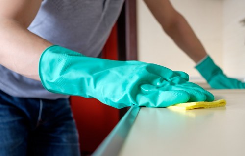 Local cleaner treating fabric chairs with specialist upholstery equipment
